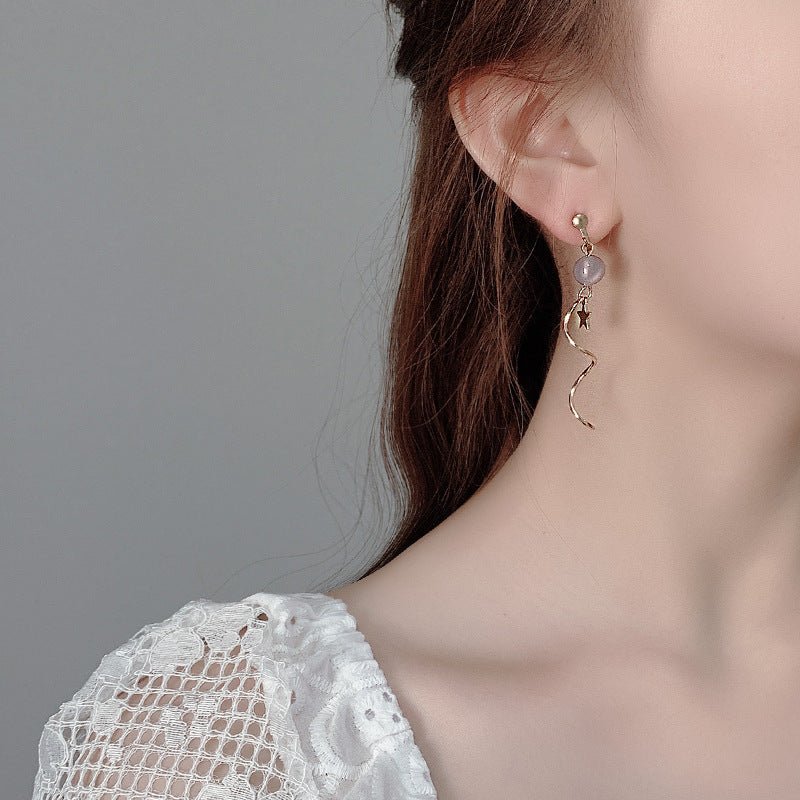 Step into the spotlight with our Crinkle Style Earrings,